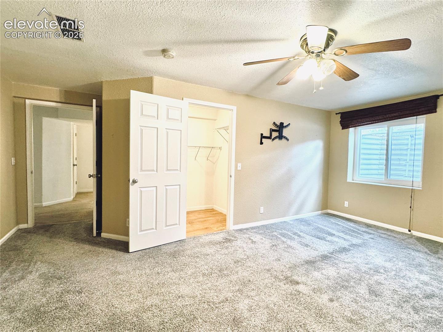 9362 St.George Road Falcon, CO 80831 - Photo 29 of 44 Large Bedroom with walk in closet