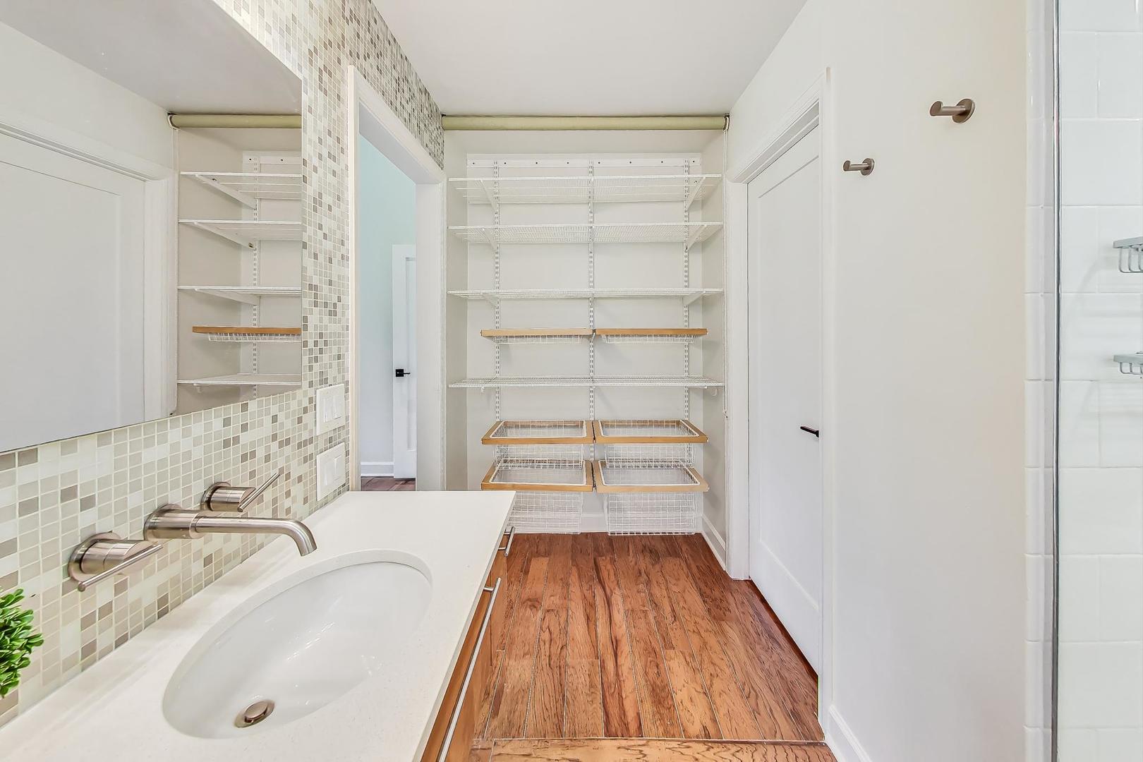 1169 Brighton Road Naperville, IL 60563 - Photo 20 of 54 a bathroom with a sink and a bathtub