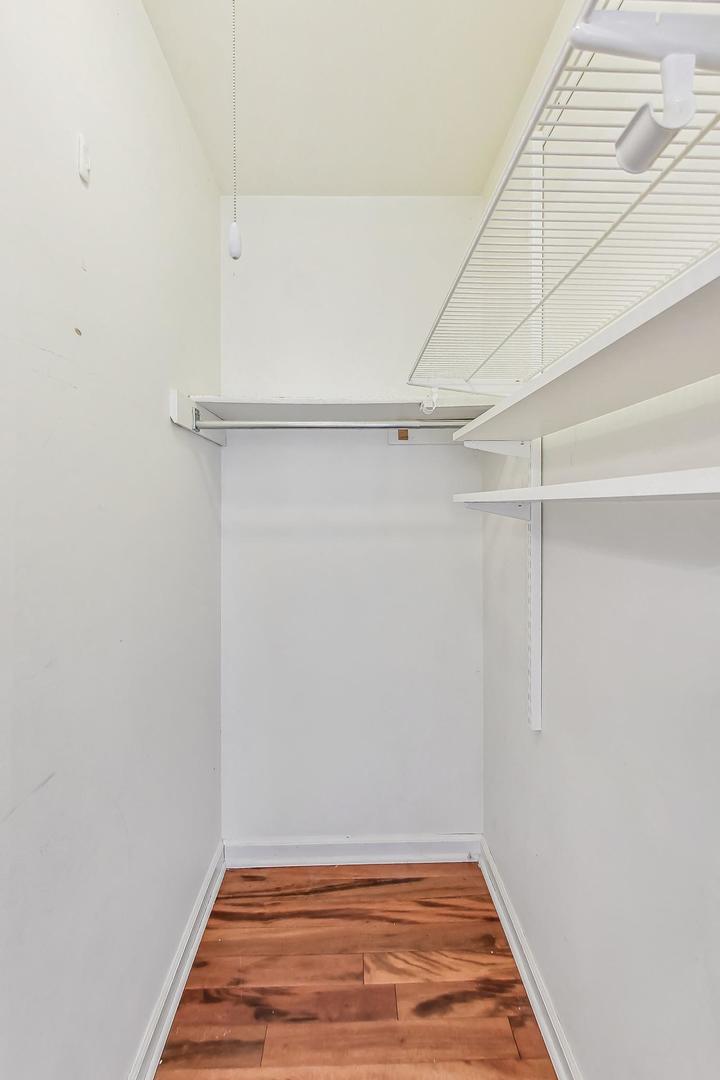1169 Brighton Road Naperville, IL 60563 - Photo 26 of 54 a view of a room with empty racks