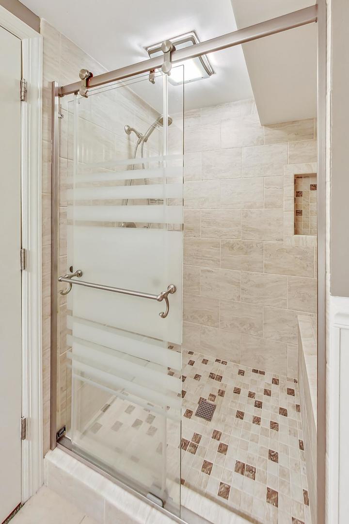 1169 Brighton Road Naperville, IL 60563 - Photo 40 of 54 a bathroom with a shower
