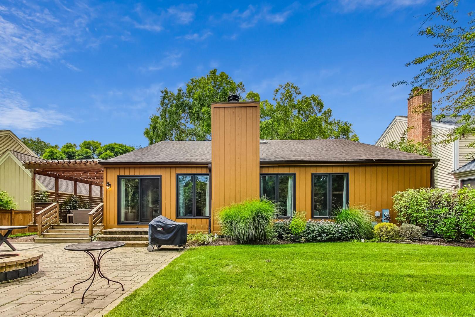 1169 Brighton Road Naperville, IL 60563 - Photo 45 of 54 a view of a house with backyard and a tree