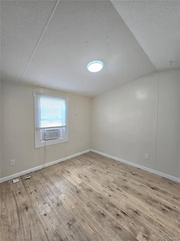 a bathroom with a sink toilet a mirror and bathtub