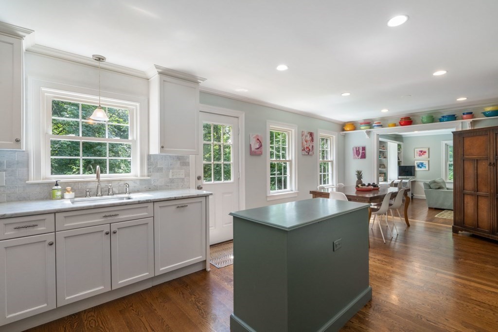 20 Chatham Circle Wellesley, MA 02481 - Photo 13 of 30 a living room with granite countertop kitchen island furniture and a sink