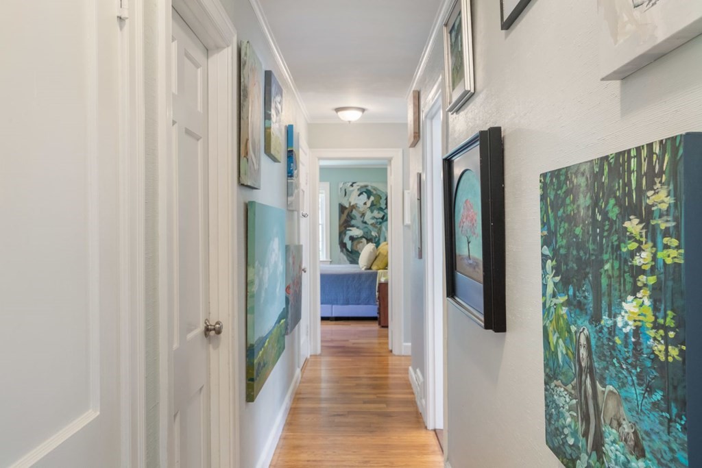 20 Chatham Circle Wellesley, MA 02481 - Photo 16 of 30 a view of a hallway with wooden floor and windows