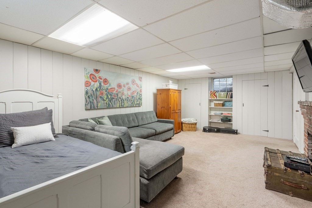 20 Chatham Circle Wellesley, MA 02481 - Photo 25 of 30 a living room with furniture and a couch