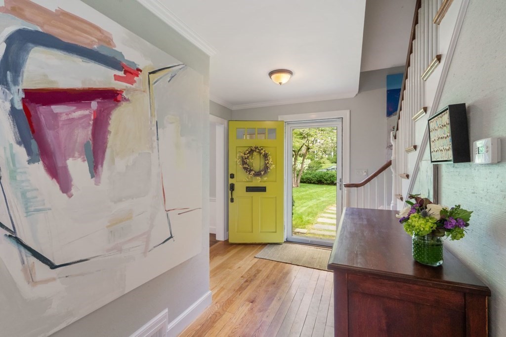 20 Chatham Circle Wellesley, MA 02481 - Photo 4 of 30 a view of a hallway with wooden floor and a potted plant