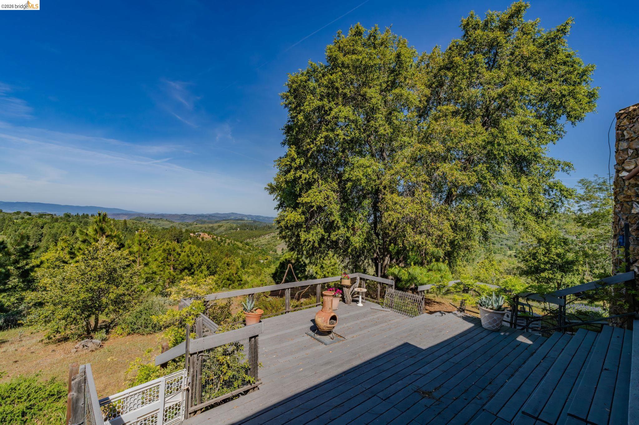 6161 Fullen Road Murphys, CA 95247 - Photo 15 of 53 a view of a balcony with chairs