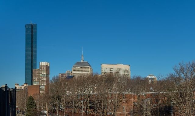 a view of a city with tall buildings