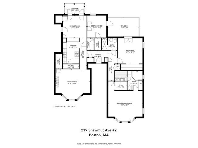 a buildings and cars parked on the side of a street