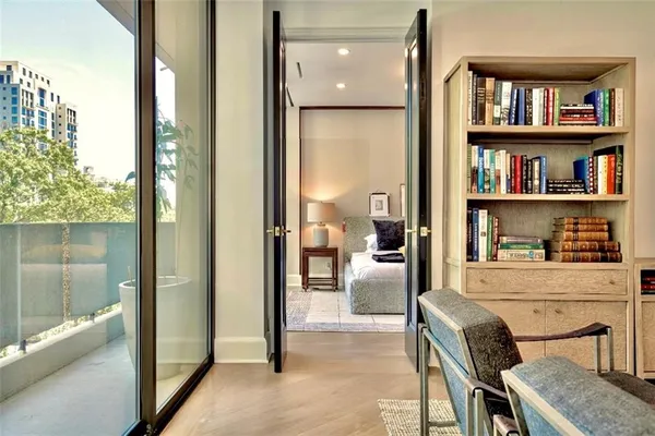 a workspace with furniture and a book shelf