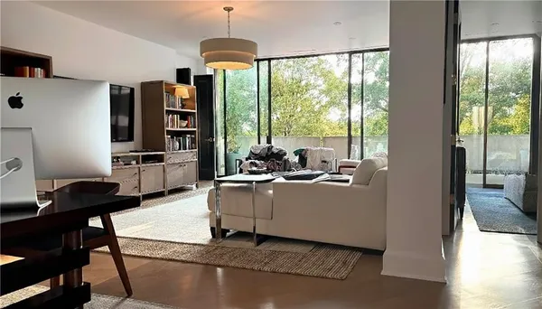 a view of a livingroom with furniture window and outside view