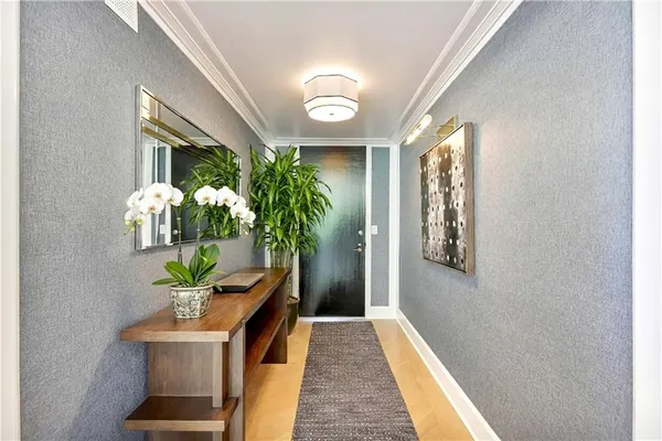 a view of entryway with wooden floor