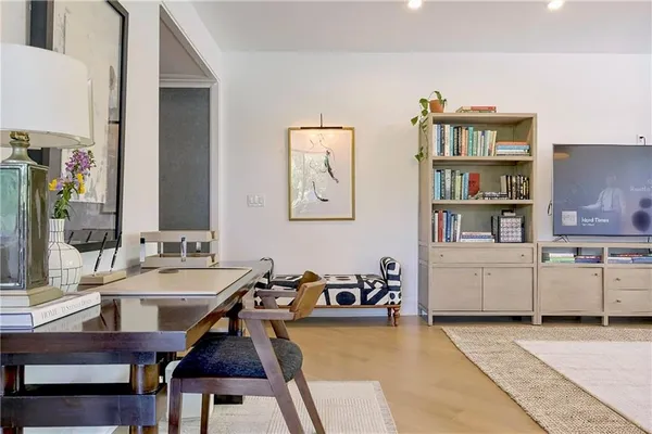 a room with furniture and wooden floor