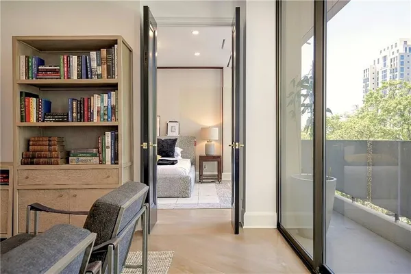 a view of a livingroom with furniture and cabinet