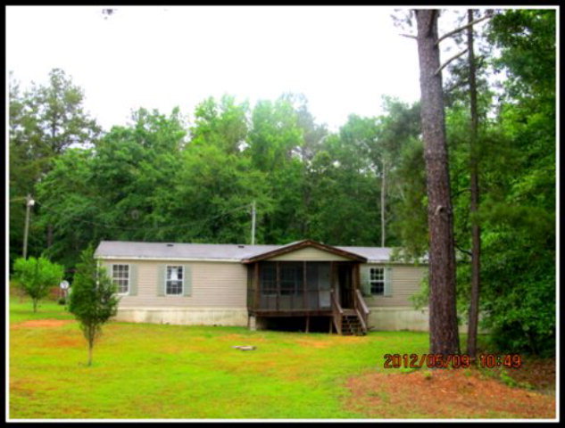 136 Old Benton Road Juliette, GA 31046 - Photo 1 of 1 a view of a house with a yard balcony