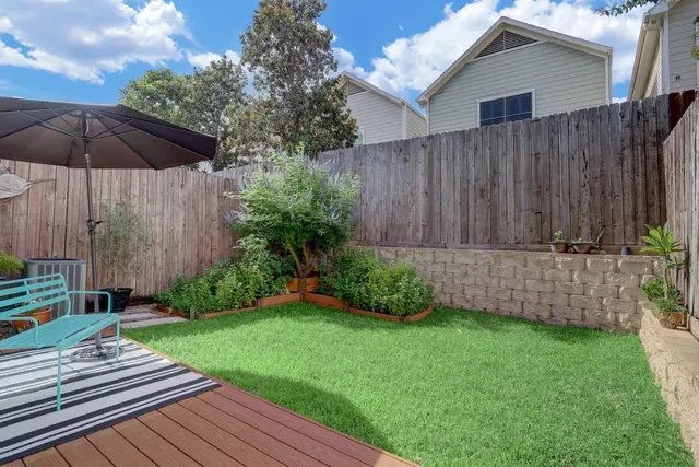 a view of a backyard with a garden