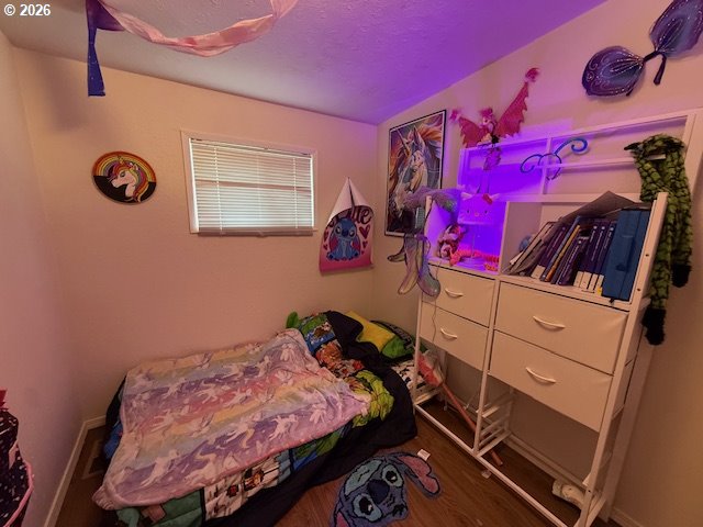 8429 Duncan Island Road Mapleton, OR 97453 - Photo 15 of 24 a bed room with a bed and a closet
