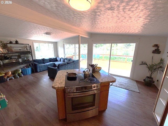 8429 Duncan Island Road Mapleton, OR 97453 - Photo 18 of 24 a living room with furniture and a wooden floor