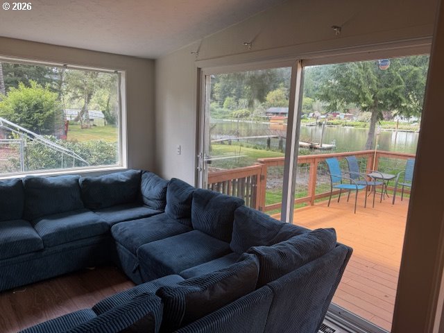 8429 Duncan Island Road Mapleton, OR 97453 - Photo 19 of 24 a living room with furniture and a large window