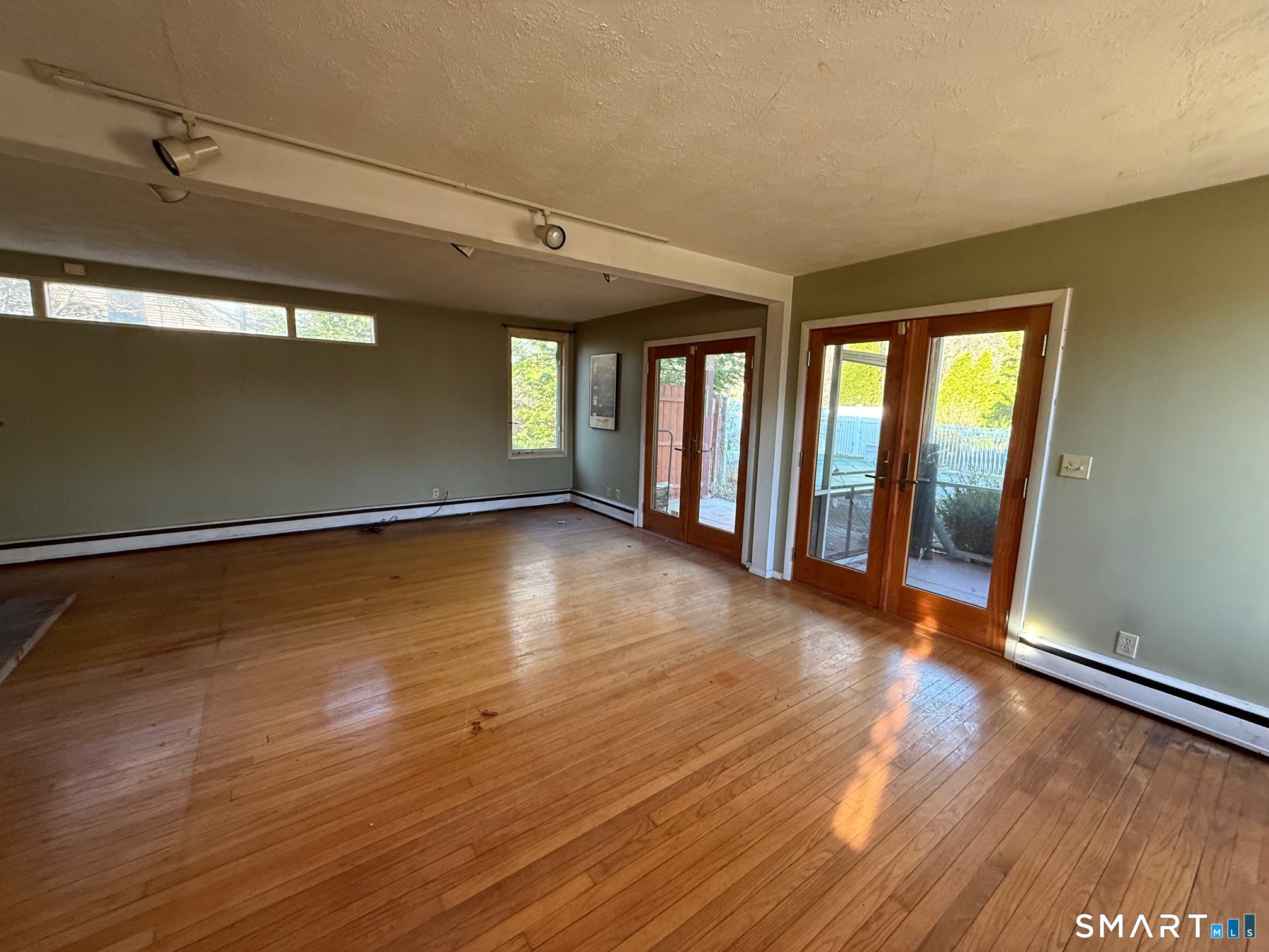 491 Shepard Avenue Hamden, CT 06514 - Photo 15 of 18 wooden floor in an empty room with a window