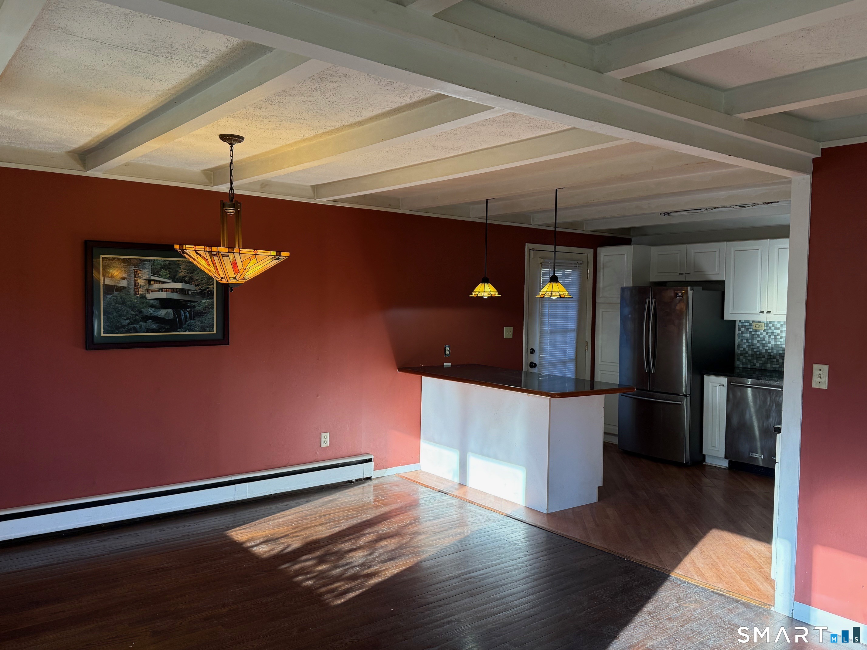 491 Shepard Avenue Hamden, CT 06514 - Photo 4 of 18 a kitchen with stainless steel appliances granite countertop a refrigerator a stove and a wooden floors