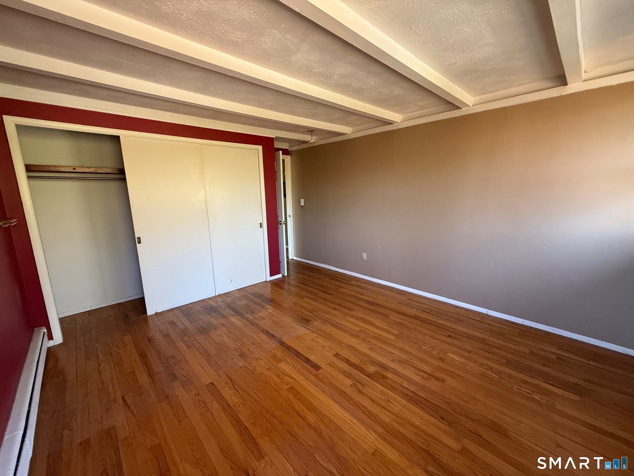 491 Shepard Avenue Hamden, CT 06514 - Photo 8 of 18 a view of empty room with wooden floor