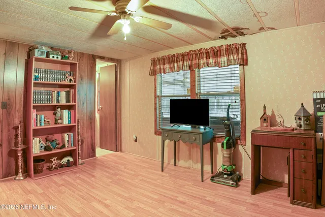 a bathroom with a sink mirror bathtub and toilet