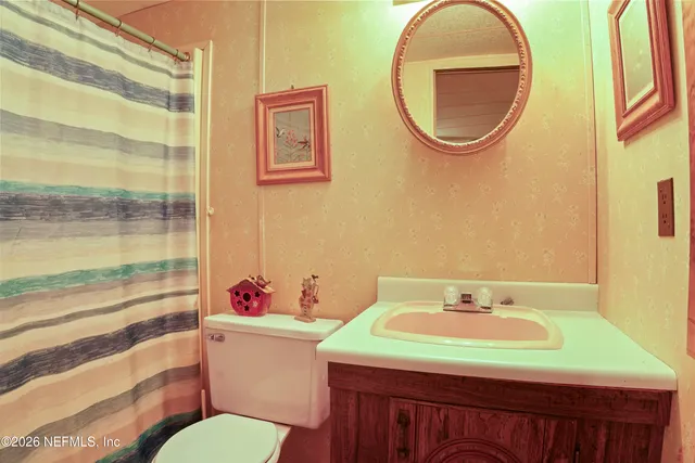 a view of a workspace with furniture