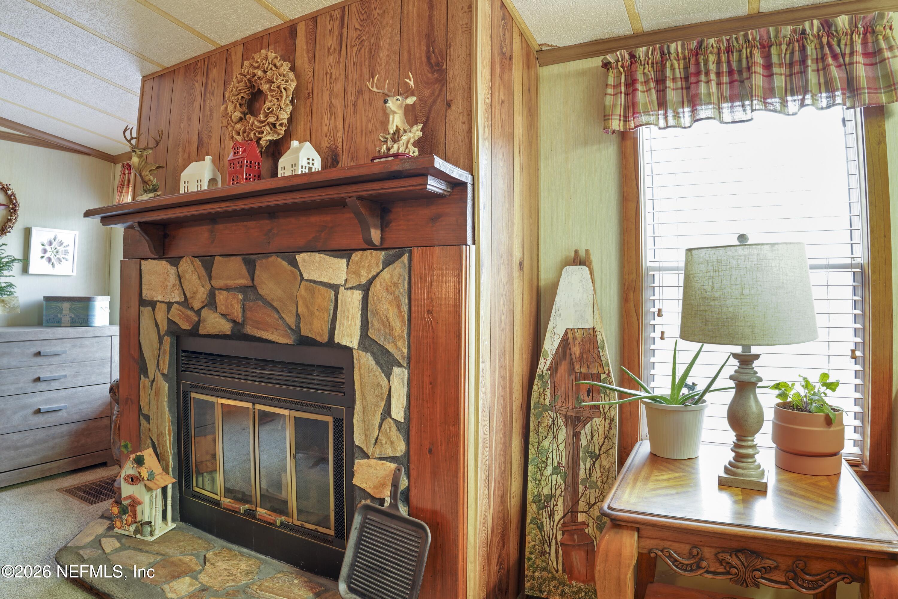 10697 County Road 127 Sanderson, FL 32087 - Photo 31 of 40 a view of living room with furniture and a fireplace