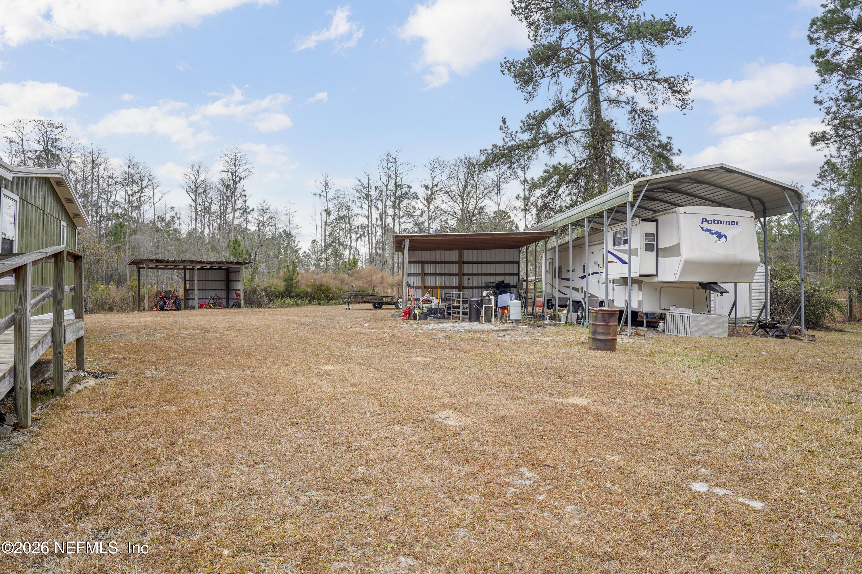10697 County Road 127 Sanderson, FL 32087 - Photo 10 of 40 a view of a town with large trees