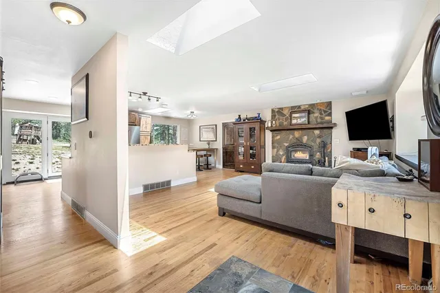 a living room with furniture and a table