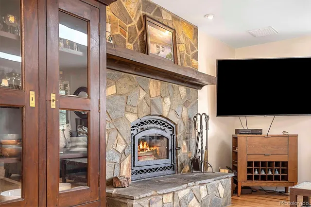 a kitchen with stainless steel appliances granite countertop a stove and a sink