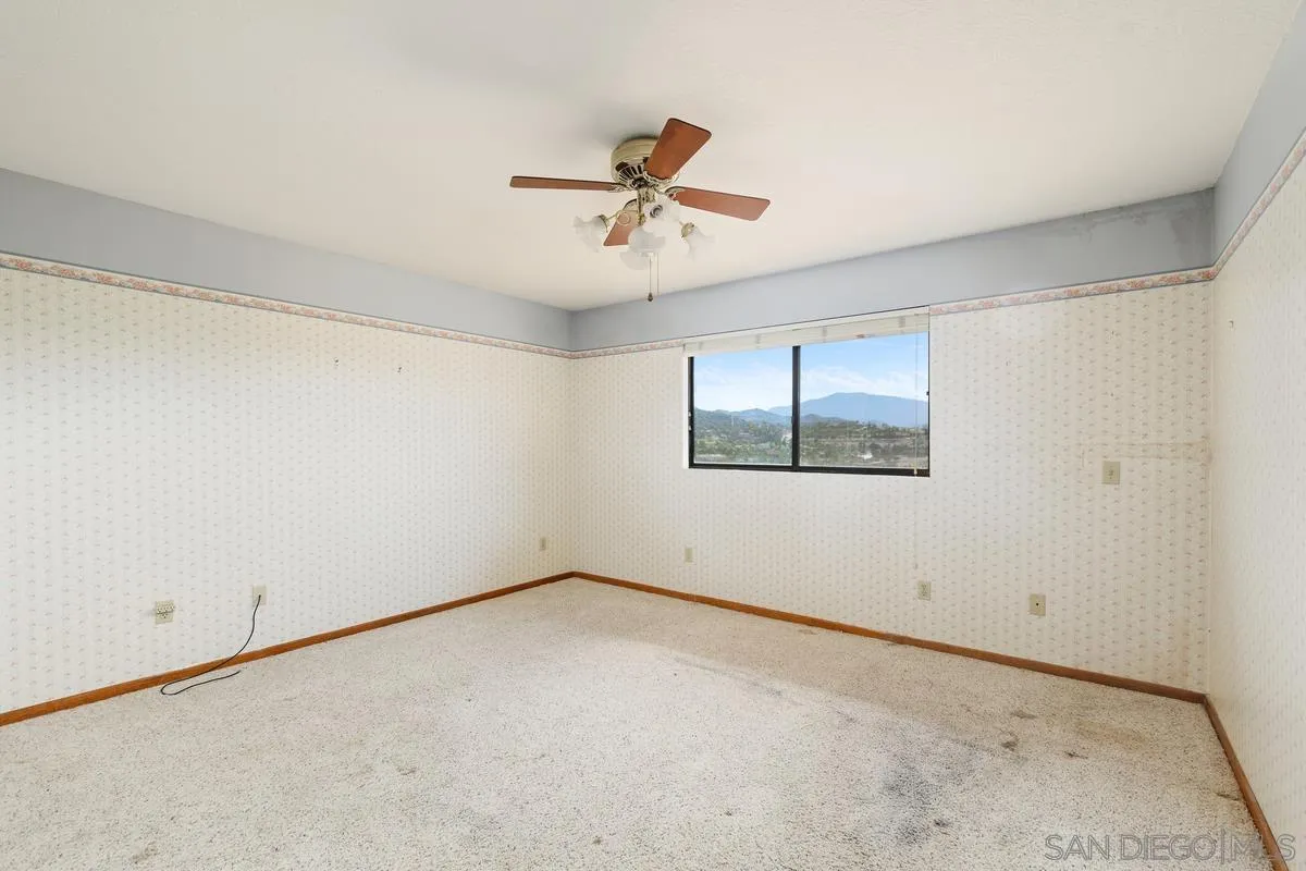 10099 El Capitan Real Road El Cajon, CA 92021 - Photo 20 of 41 a view of an empty room with a window