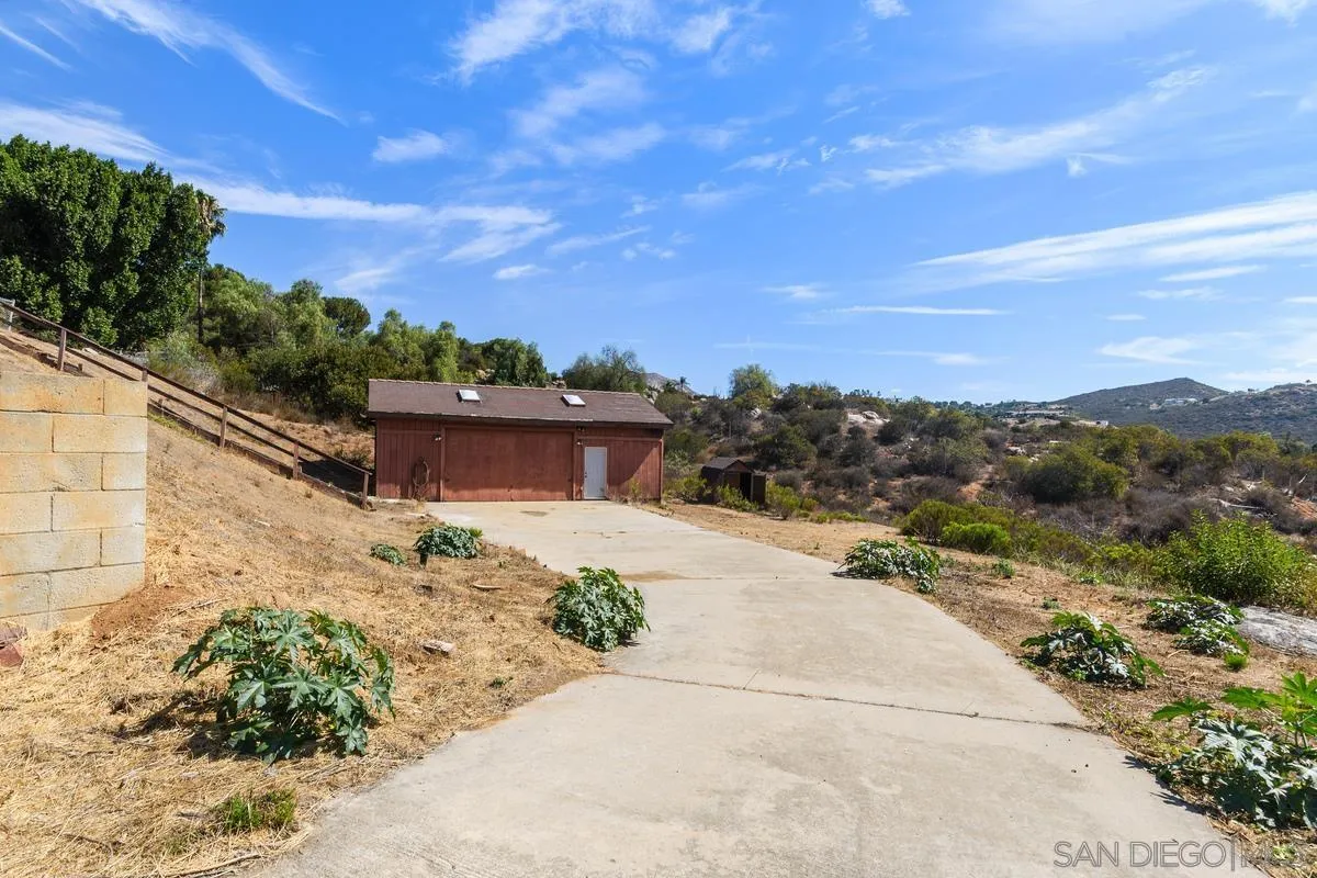 10099 El Capitan Real Road El Cajon, CA 92021 - Photo 36 of 41 a view of a terrace with a garden