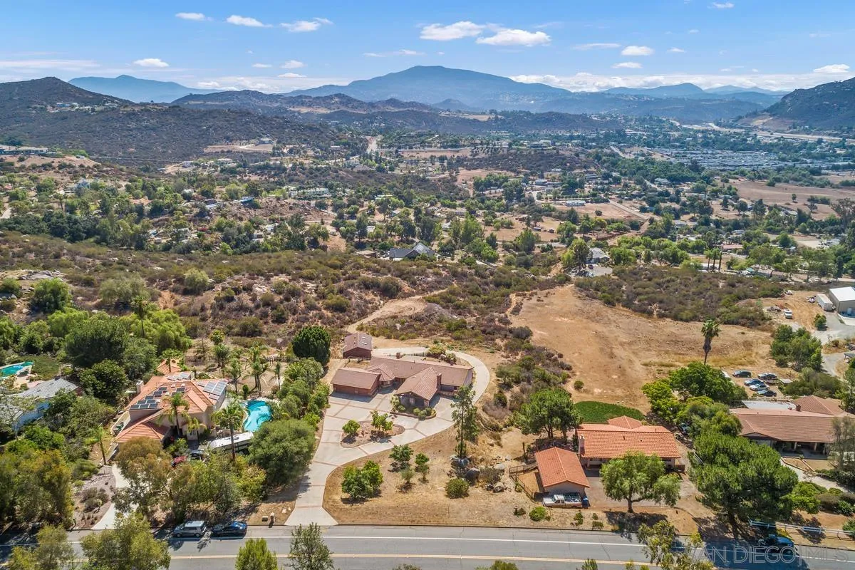 10099 El Capitan Real Road El Cajon, CA 92021 - Photo 37 of 41 an aerial view of residential houses with outdoor space