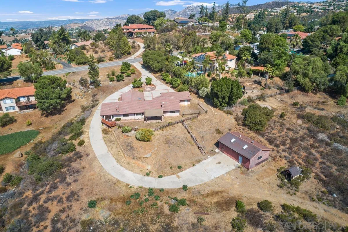 10099 El Capitan Real Road El Cajon, CA 92021 - Photo 39 of 41 an aerial view of a house with a yard