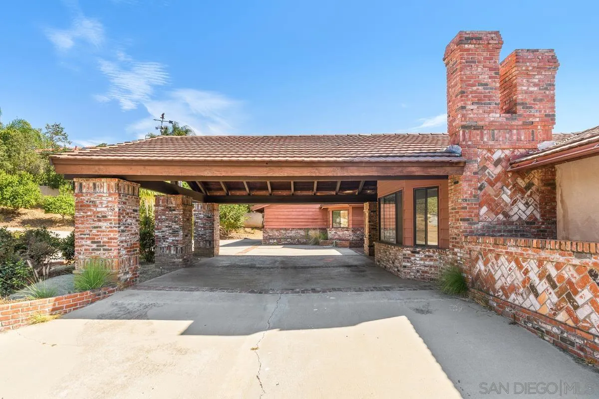 10099 El Capitan Real Road El Cajon, CA 92021 - Photo 6 of 41 front view of a building with a street