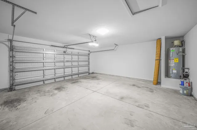 a kitchen with granite countertop stainless steel appliances and wooden cabinets