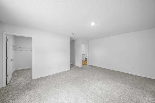 a bathroom with a sink toilet and vanity