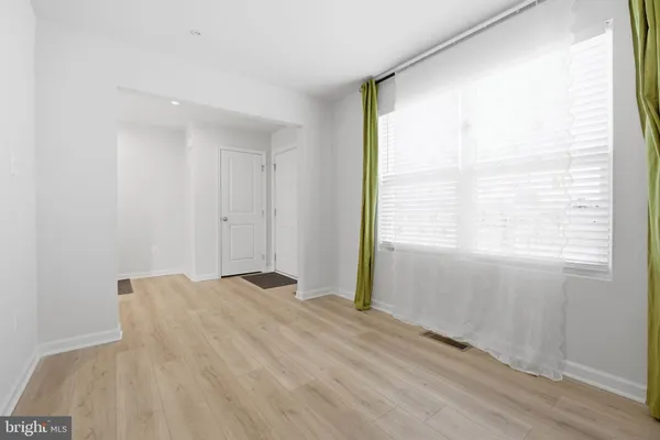 a view of a room that has a window in it