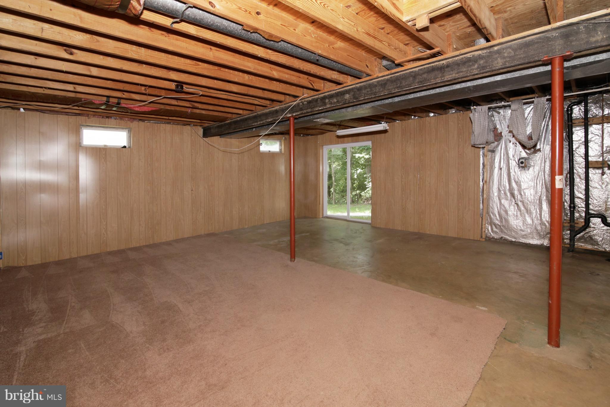 8452 Rushing Creek Court Springfield, VA 22153 - Photo 14 of 30 Large Unfinished Walkout Basement