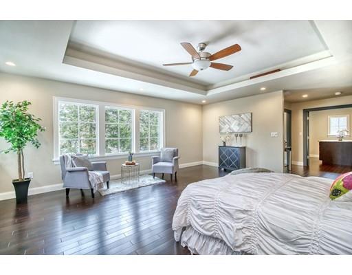 171 Pond Plain Road Westwood, MA 02090 - Photo 19 of 29 a bedroom with furniture and a large window