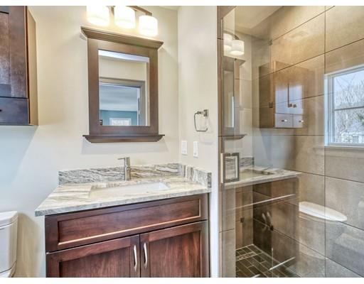 171 Pond Plain Road Westwood, MA 02090 - Photo 26 of 29 a bathroom with a sink and a mirror