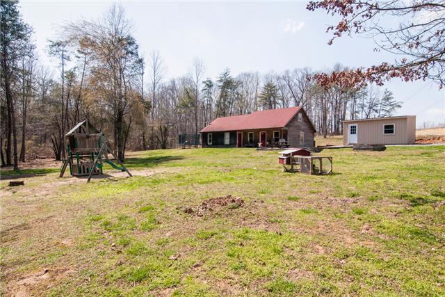 7194 Drag Strip Road Fairview, TN 37062 - Photo 1 of 20 a view of a house with swimming pool and sitting area