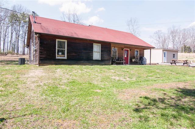 7194 Drag Strip Road Fairview, TN 37062 - Photo 6 of 20 a front view of a house with a yard