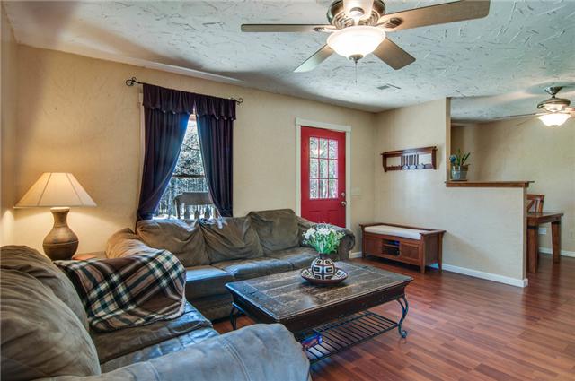 7194 Drag Strip Road Fairview, TN 37062 - Photo 8 of 20 a living room with furniture and a lamp