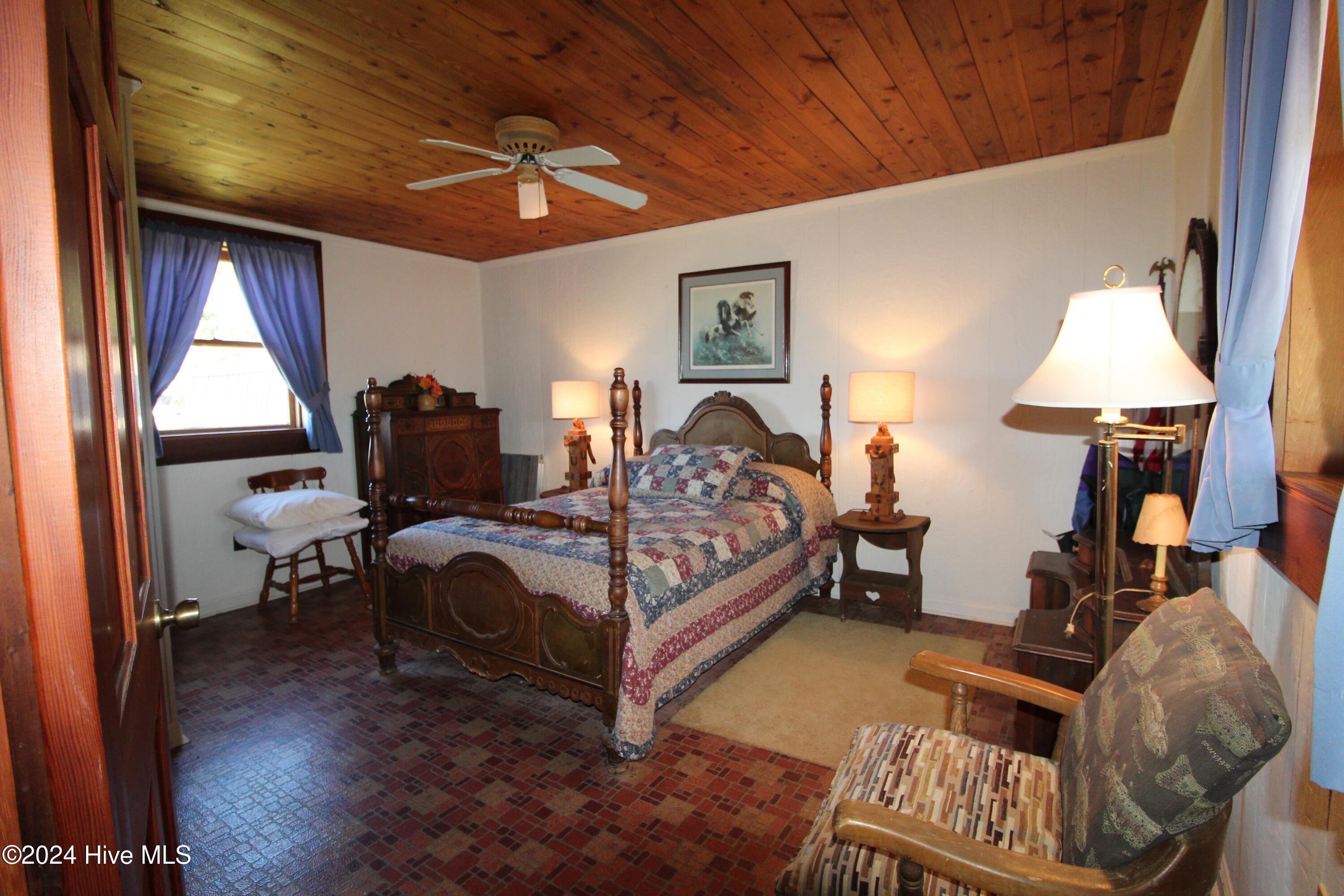 455 Hogan Farm Road Seagrove, NC 27341 - Photo 81 of 87 cabin downstairs bedroom - Copy
