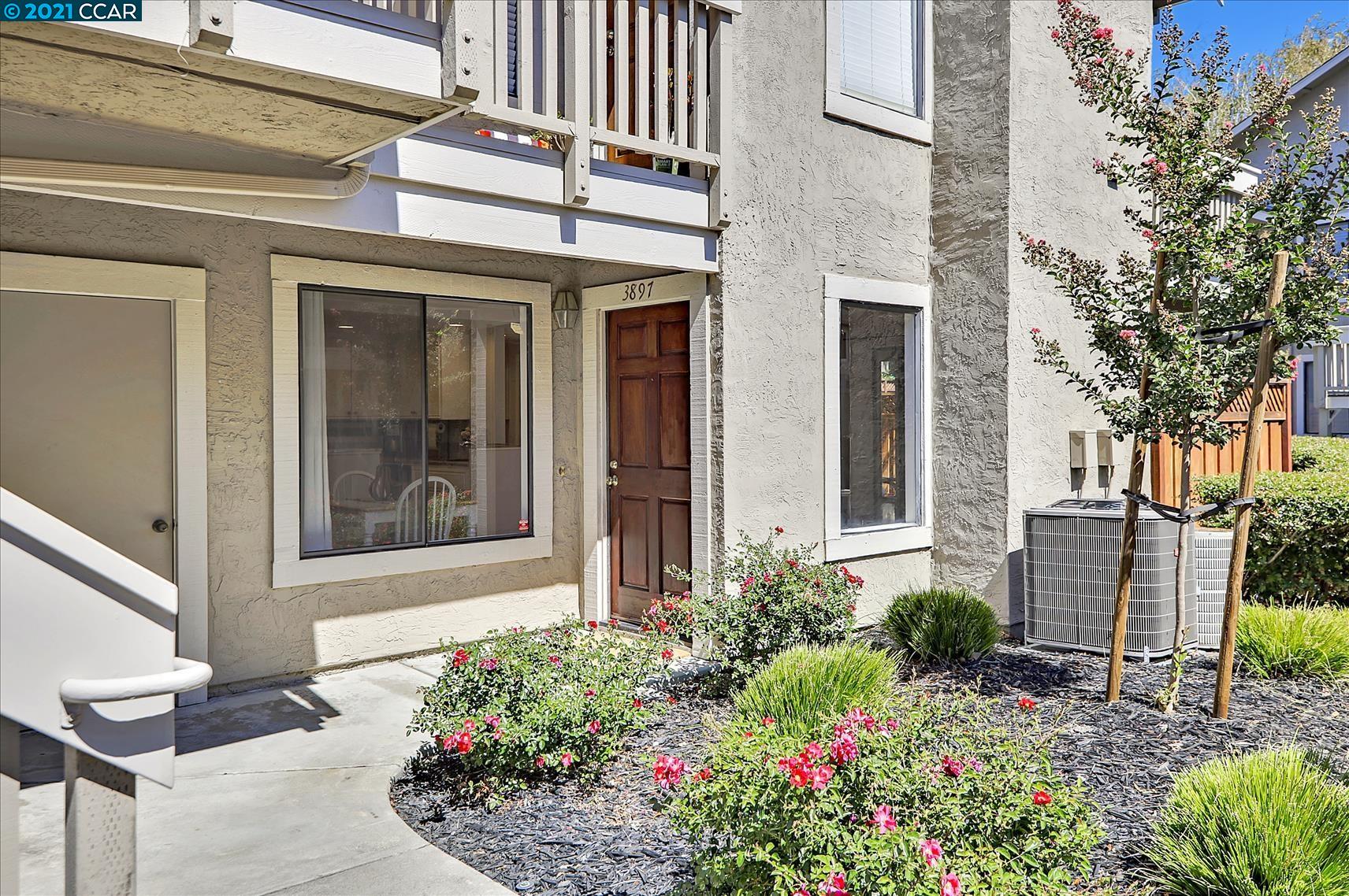 3897 Crow Canyon Road San Ramon, CA 94582 - Photo 1 of 1 a front view of a house with a garden