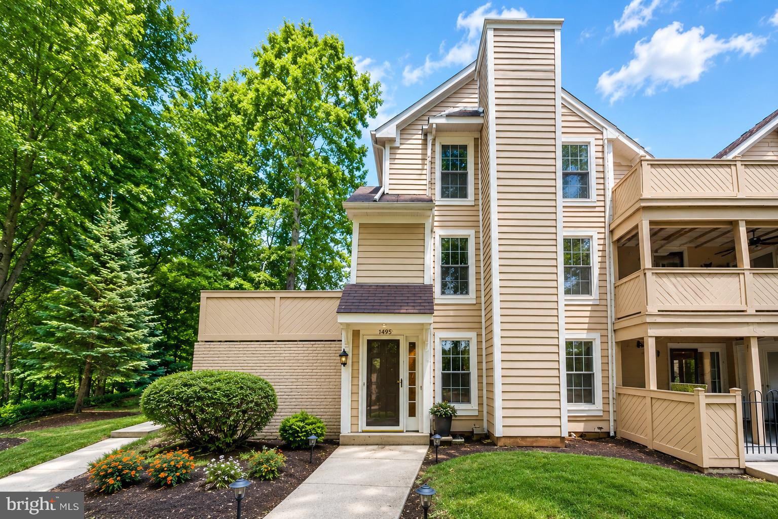 1495 Church Hill Place Reston, VA 20194 - Photo 1 of 27 a view of a house with a yard