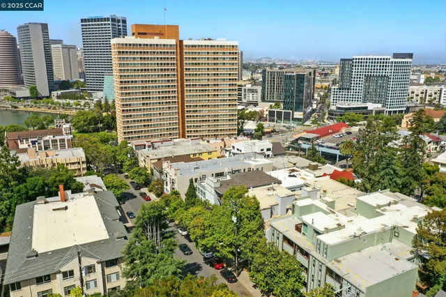 an aerial view of residential building and parking space